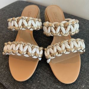 Schutz sandals in white and gold with woven heel